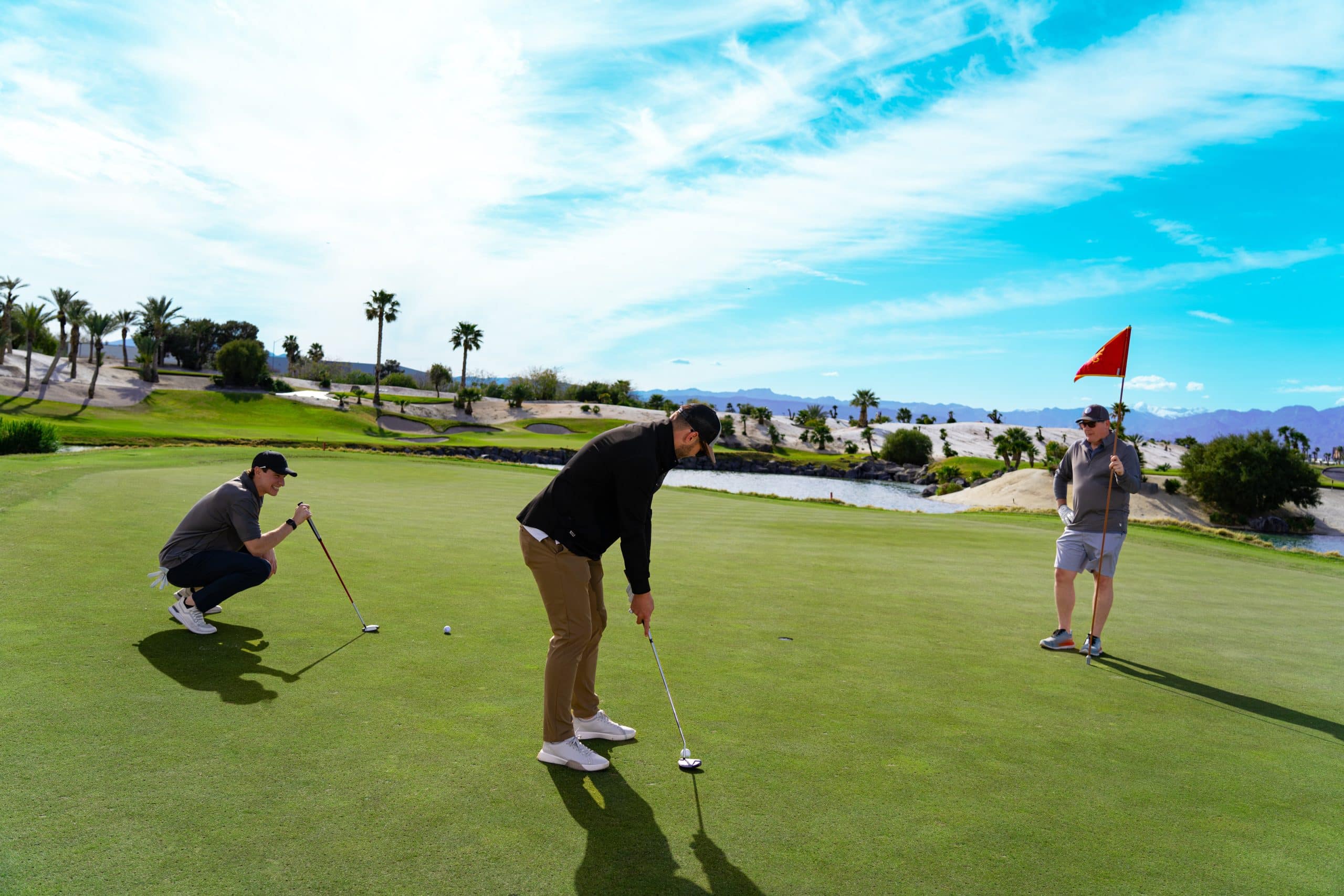 Golfers celebrating on the course at Bali Hai Golf Club